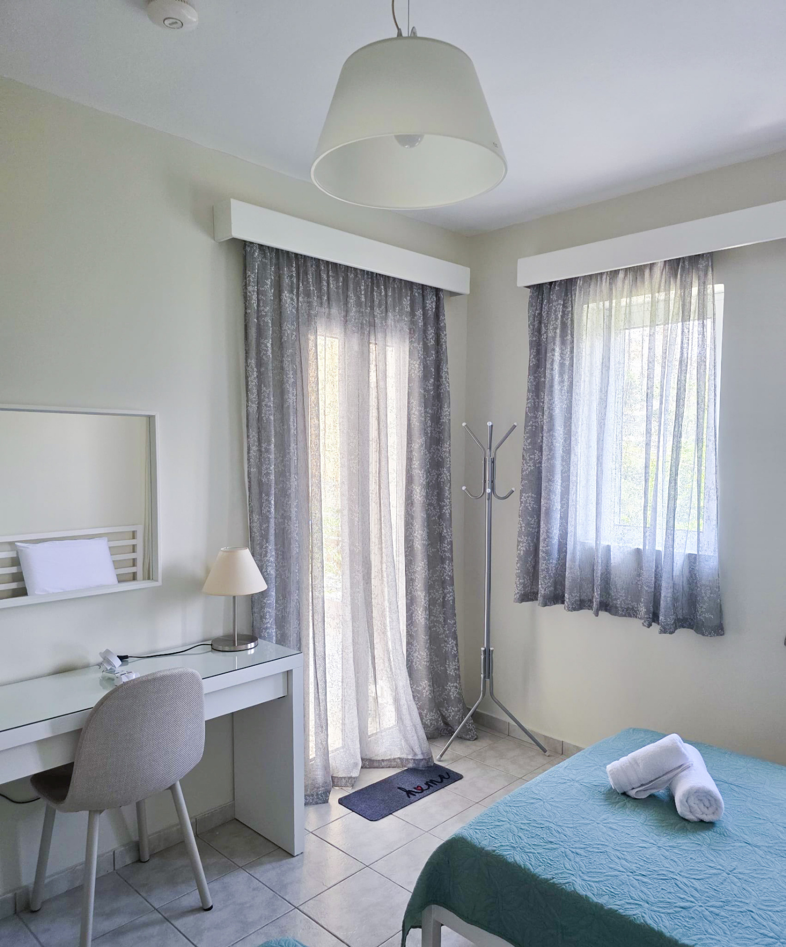 Third bedroom with desk and natural light